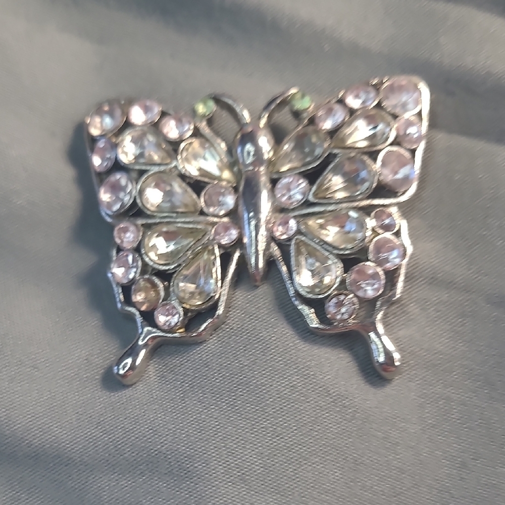 Elegant Silver Toned Butterfly Brooch with Pink Accents